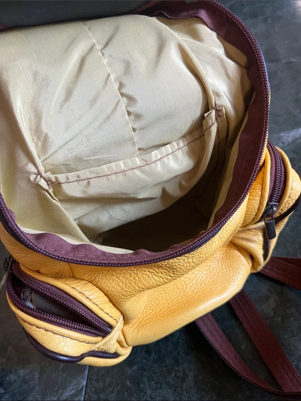 Yellow Leather Backpack with Dark Brown Trim and Top Handle